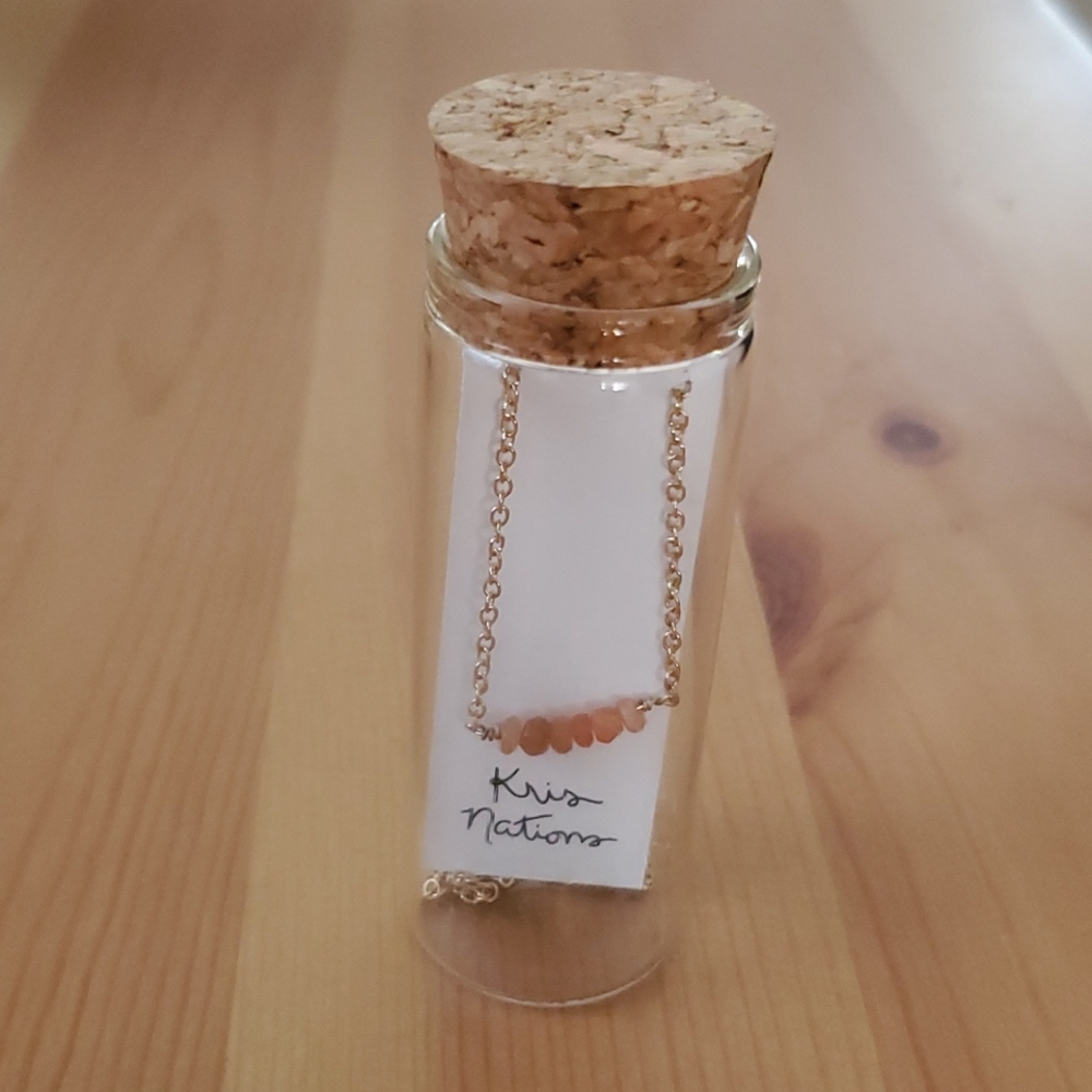Kris Nation's moon stone necklace